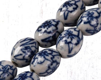 Blue and soft white porcelain plum blossom beads, 19 pcs, 17.5x13.5 mm rounded oval egg beads with plum blossom design, hand painted (C0129)