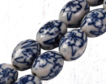 Blue and white porcelain plum blossom beads, 19 pcs, 17.5x13.5 mm rounded oval egg beads with plum blossom design, hand painted