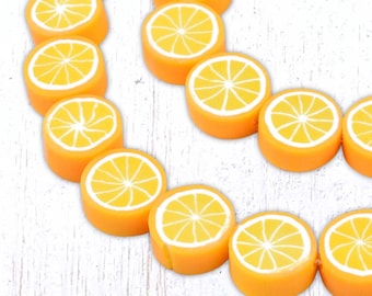 38 polymer clay orange slice beads, ~9-9.5mm with 1.5mm hole, bright orange and yellow (C0149)