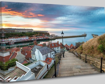 Stunning sunset over the 199 steps leading down to whitby harbour on the yorkshire coast wall art picture print