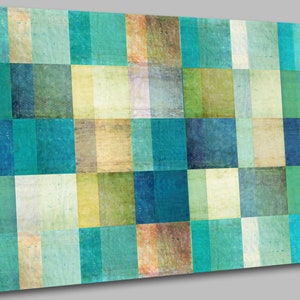 May include: Abstract art print featuring a grid of squares in shades of blue, green, and yellow. The colours are muted and have a vintage, distressed look.