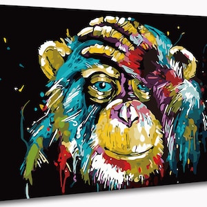 May include: A colourful abstract painting of a monkey's face with a hand over its forehead. The monkey's fur is painted in shades of blue, green, yellow, and purple. The background is black.