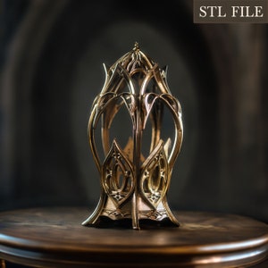 May include: A gold-colored metal decorative cage with intricate details. The cage is sitting on a wooden table. STL FILE.