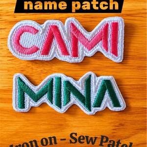 May include: Two custom name patches with white borders. The top patch features the name CAMI in pink embroidery, and the bottom patch features the name MINA in green embroidery. Text in the image reads Custom name patch and Iron on - Sew Patch.