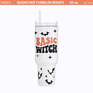 May include: White 40 ounce tumbler with a black and orange design. The tumbler has a straw and says "Basic Witch" in a retro font with bats and stars.