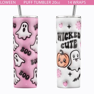 May include: Two 20oz stainless steel tumblers with Halloween designs. The pink tumbler has a ghost and "BOO" pattern. The white tumbler has a pumpkin, ghost, and the text "WICKED CUTE".