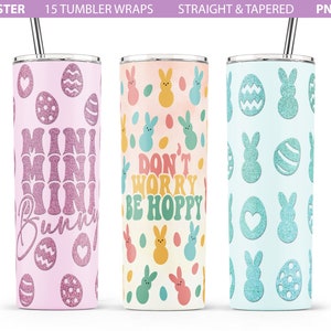 May include: Three different designs for 20 oz tumbler wraps. The first design is pink with glitter and says "Mini Mini Mini Bunny". The second design is a pastel yellow and blue with a watercolor background and says "Don't Worry Be Hoppy". The third design is light blue with glitter and features a repeating pattern of bunnies and eggs.