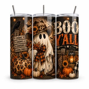 May include: A cylindrical tumbler with a straw featuring a Halloween-themed design. The print displays a ghost wearing a cowboy hat, a leopard-print pumpkin, sunflowers, a lantern, and a wooden sign with the text SPOOKY COWBOYS PUMPKINS GOOD TIMES.
