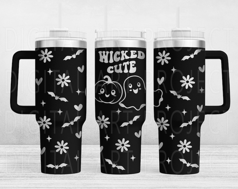 May include: Black tumbler with a handle, featuring a white pattern of flowers, bats, hearts, and stars. The center of the tumbler has the words "WICKED CUTE" with a pumpkin and ghost illustration.