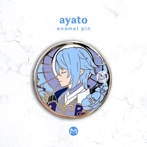May include: A silver enamel pin featuring a blue-haired anime character with a light blue background. The character is wearing a blue and gold outfit with a flower design. The pin says "ayato enamel pin" at the top.