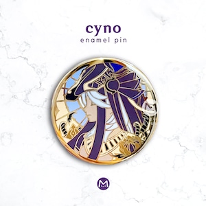 May include: A gold enamel pin featuring a character from the video game Genshin Impact. The character is Cyno, a polearm user with a distinctive purple and gold outfit and a mask. The pin is circular and has a detailed design.