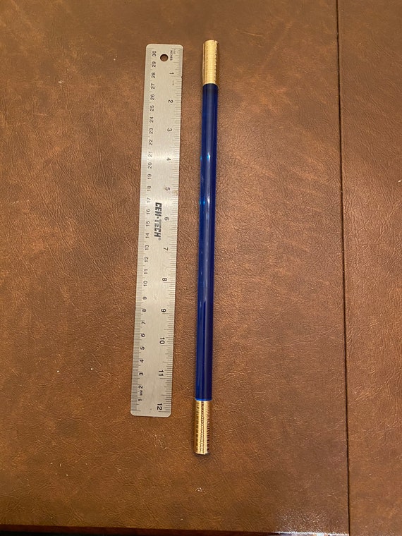 Lucite magic wand with gold tips