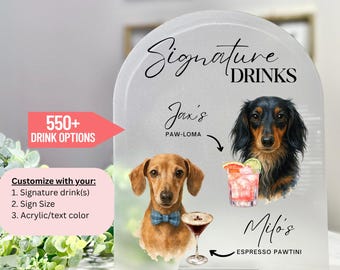 May include: Clear acrylic sign with the words "Signature Drinks" in elegant script. The sign features illustrations of two dachshunds, drink options, and the text "550+ Drink Options". Customize with signature drinks, sign size, and acrylic/text color.