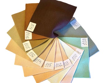 May include: A color chart with 12 fabric swatches arranged in a circle. The swatches are labeled with numbers, including 102, 103, 105, 114, 115, 116, 704, 705, 706, 817, 818, and 1004.