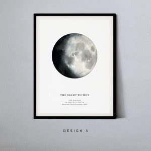 May include: A watercolor illustration of the moon in a black frame with the text "THE NIGHT WE MET" and the location and date "Fife, Scotland 56.2082&deg; N, 3.1495&deg; W Saturday 10th December 2005".