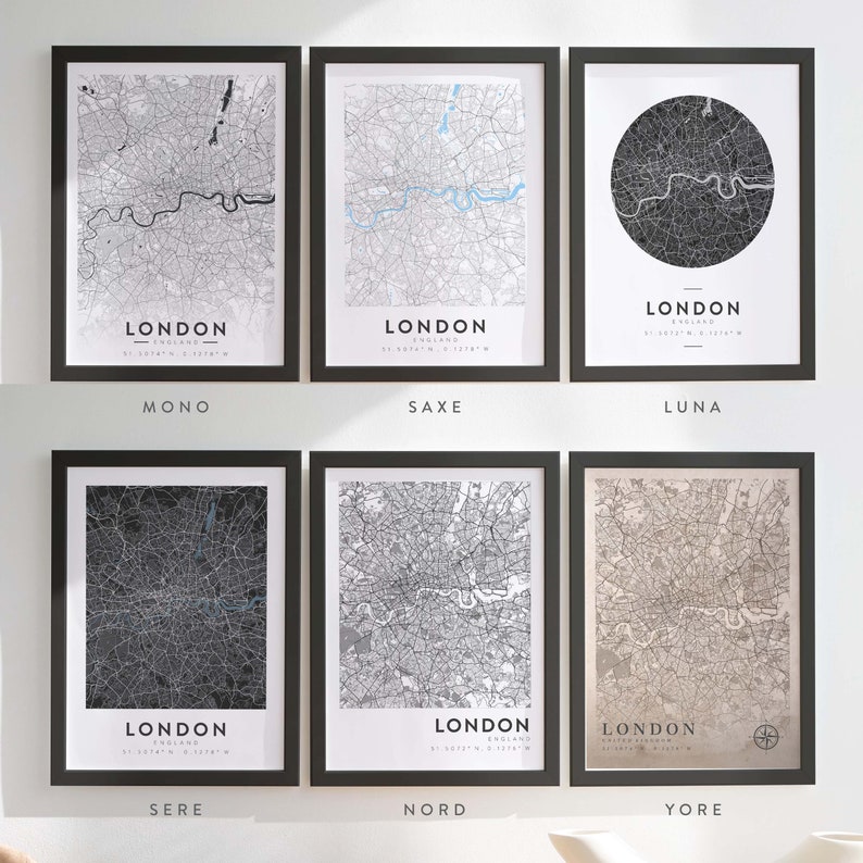 May include: Six framed black and white maps of London, England. Each map has a different style, including a monochrome map, a map with blue water features, a map with a black circle around the city, a map with a dark background, a map with a light background, and a map with a beige background. The maps are labeled with the city name, "London", and the country, "England". The maps are also labeled with the coordinates of London. The styles are labeled "Mono", "Saxe", "Luna", "Sere", "Nord", and "Yore".