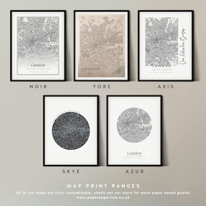 May include: A set of 6 different map prints of London, England. The prints are in various styles, including black and white, sepia toned, and a circular design. The prints are all framed in black frames and have the text "London, United Kingdom" printed on them.