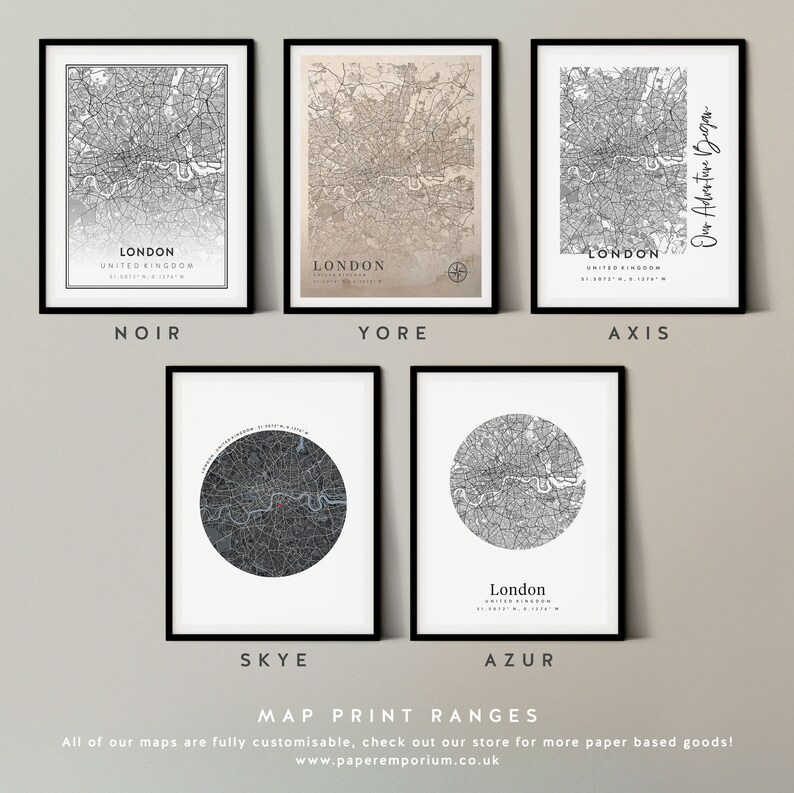 May include: A set of 6 different map prints of London, England. The prints are in various styles, including black and white, sepia toned, and a circular design. The prints are all framed in black frames and have the text "London, United Kingdom" printed on them.