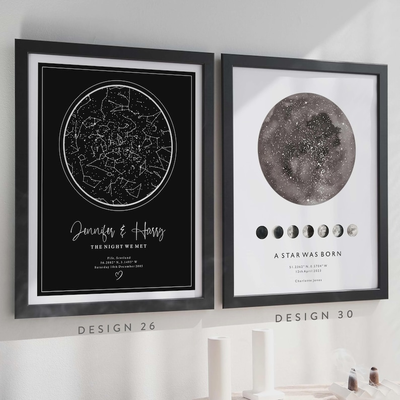 May include: Two framed art prints. One features a black background with a white star map and the text "Jennifer & Harry, The Night We Met." The other print shows a grayscale moon and phases with the text "A Star Was Born."