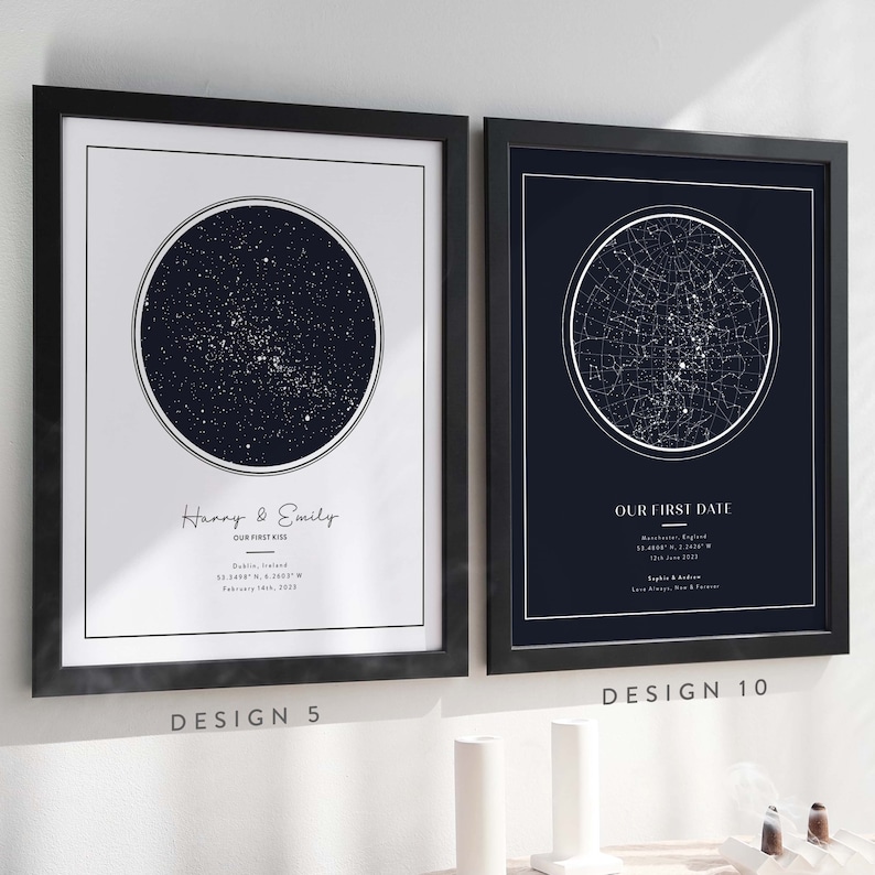 May include: Two framed star maps with black frames. The left map is white with a dark blue circle showing the constellations on the night of a first kiss. The text reads "Harry & Emily, Our First Kiss, Dublin, Ireland, 53.3487&deg; N, 6.2603&deg; W, February 14th, 2023". The right map is dark blue with a white circle showing the constellations on the night of a first date. The text reads "Our First Date, Manchester, England, 53.4807&deg; N, 2.2426&deg; W, July 1st, 2023, Sophie & Adam, Love Lives, New & Forever".
