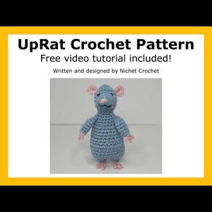 May include: A crochet pattern titled UpRat Crochet Pattern with a free video tutorial included, written and designed by Nichet Crochet. The image features a small, light blue crocheted rat with pink ears, nose, hands, and feet.
