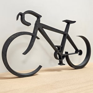 Puede incluir: Silueta negra de metal de una bicicleta con un manillar curvo y neum&aacute;ticos finos.