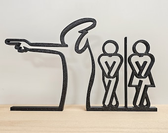 May include: Black metal restroom sign featuring a stylized figure pointing towards a male and female restroom symbol. The sign is a modern, minimalist design, suitable for commercial or home use.