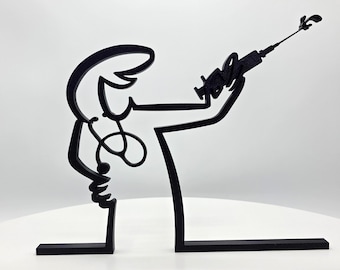 May include: A black, flat, linear sculpture depicting a stylized figure of a medical professional. The figure is shown in profile, holding a syringe upward with one arm and wearing a stethoscope around the neck, rendered in a continuous line.
