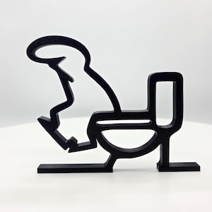 Könnte beinhalten: Schwarze, stilisierte Silhouette einer Person, die auf einer Toilette sitzt. Das Kunstwerk ist ein minimalistisches Design mit klaren Linien und einer einfarbigen schwarzen Farbe. Die Figur sitzt, Beine und Kopf sind sichtbar.