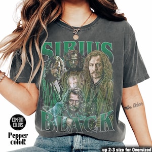 May include: Dark gray Comfort Colors t-shirt featuring a graphic of Sirius Black and the text "SIRIUS BLACK" in green. The image includes portraits of several men. The shirt is a Pepper color.