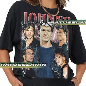 May include: Black t-shirt featuring a graphic print of Johnny Castle from the film Dirty Dancing. The graphic includes multiple images of Johnny Castle in various poses, with the text "Johnny Castle" printed in red and white lettering.