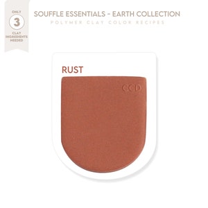 May include: A rust-colored polymer clay sample from the Souffle Essentials Earth Collection. The sample is labeled "RUST" and "CCD".