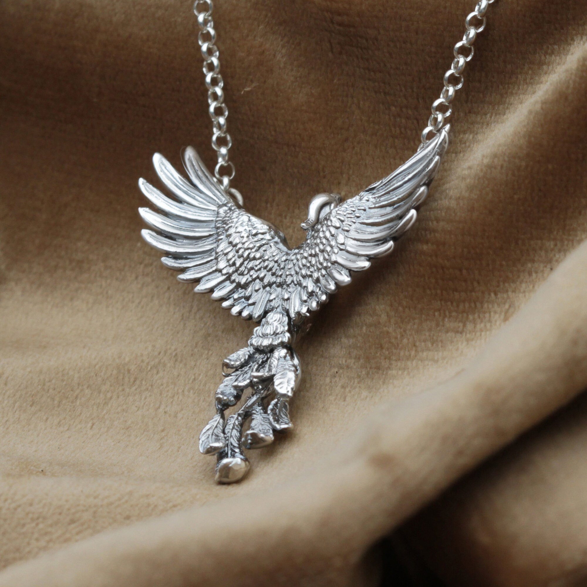 Angel of the Phoenix follows ~ Sterling Silver Jewelry