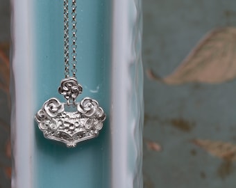 silver lock pendant