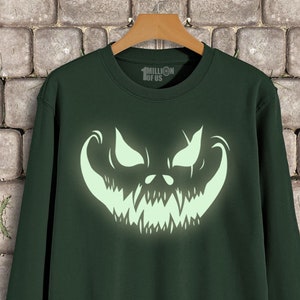 Mens / Ladies Unisex Glow In the Dark Scary Pumpkin Face Halloween Sweatshirt sizes XS-XXL
