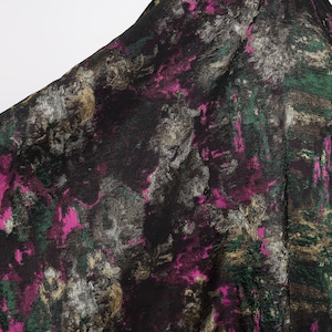 May include: Abstract fabric with a dark background, featuring splashes of magenta, green, and gold. The fabric has a textured appearance, with a pattern that resembles brushstrokes. The overall effect is artistic and modern.