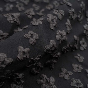 Black embossed small plum blossom Jacquard fabric 58 inch wide - sold by the yard