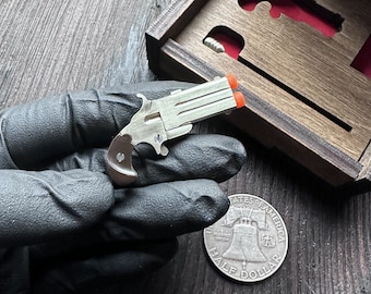 Derringer cap gun — swivel barrel pistol