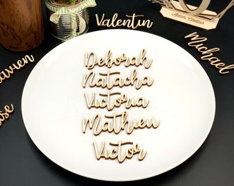 Laser cut wooden first names for wedding place markers
