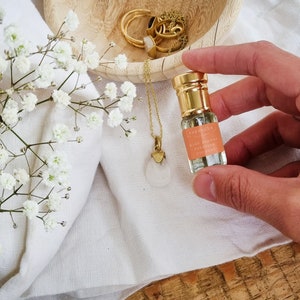 pink pepper-tuberose-coconut  // Alcohol Free, Vegan, Cruelty free roll-on perfume. Long lasting and travel size perfume.