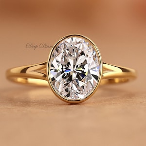Oval Lab Grown Diamond Engagement Ring: Bezel Set Split Shank