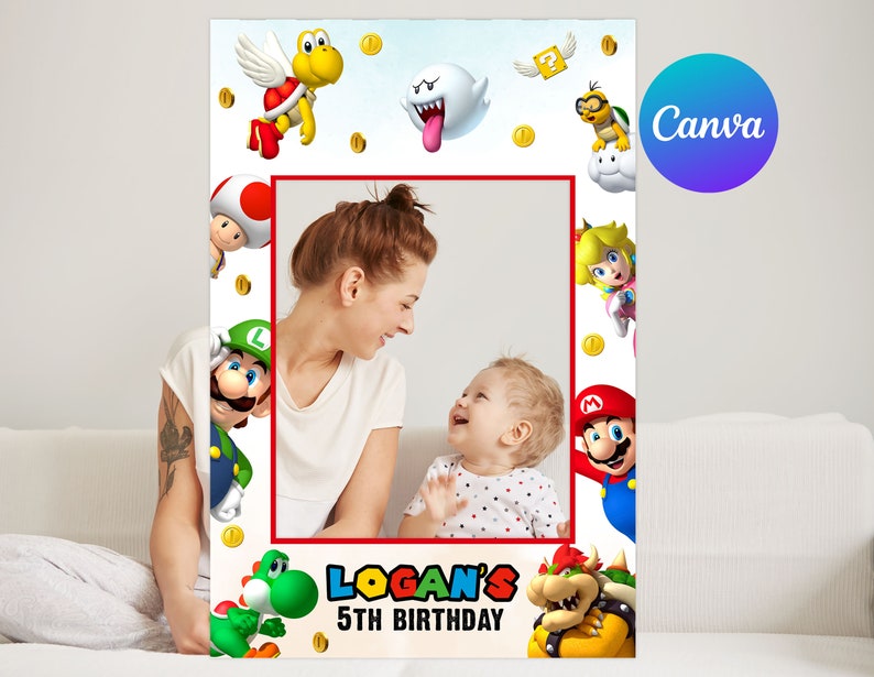 May include: A photo booth prop featuring characters from the Super Mario video game franchise. The prop has a red frame with a white background and features characters like Mario, Luigi, Bowser, and Yoshi. The text "LOGAN'S 5TH BIRTHDAY" is printed at the bottom of the frame.
