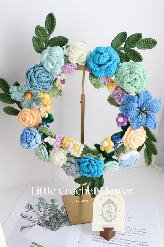 かぎ針編みの春の花のリースの手作りの花のリース、母親への