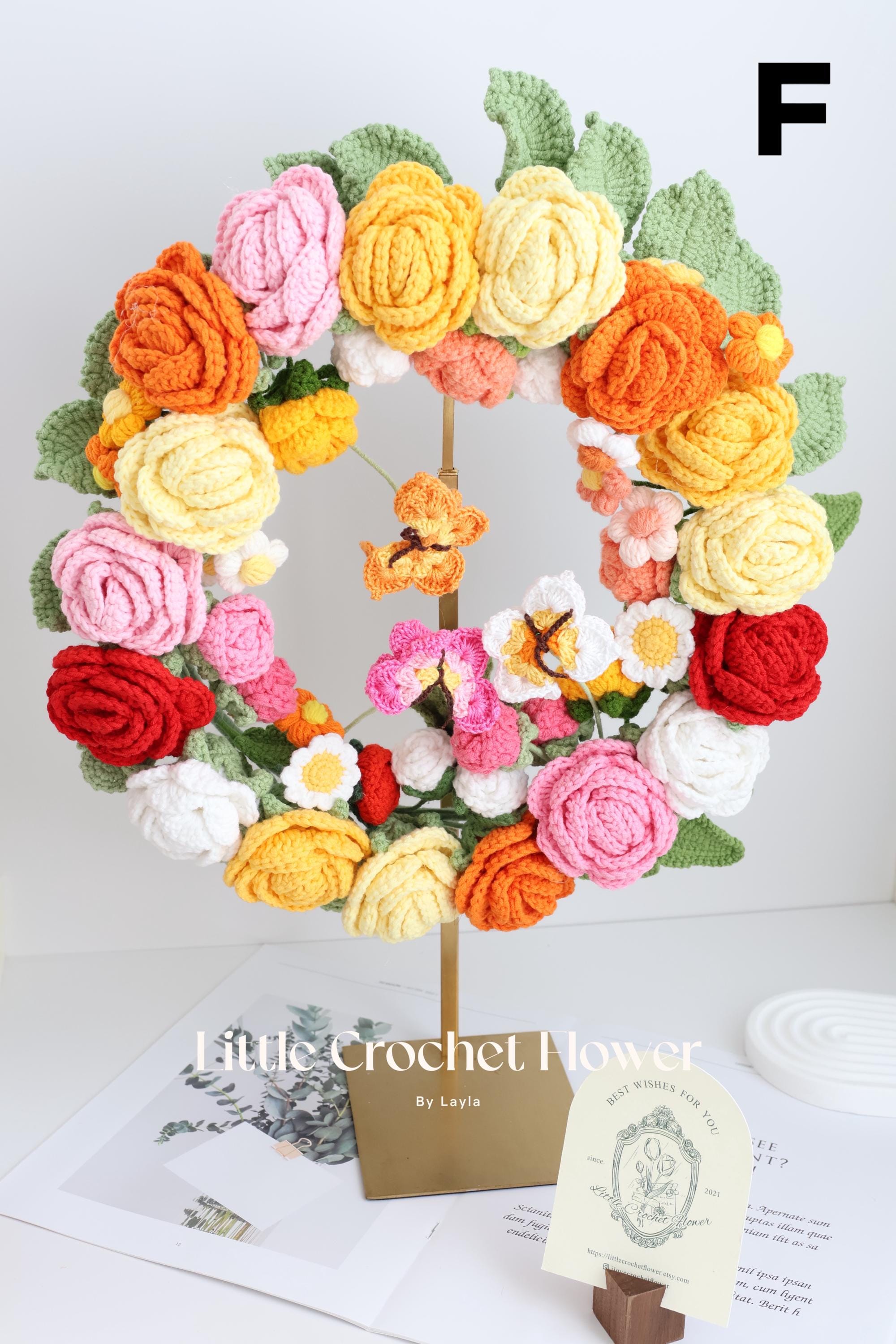 かぎ針編みの春の花のリースの手作りの花のリース、母親への