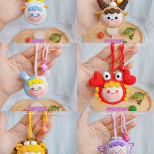 Puede incluir: Llaveros de animales del zod&iacute;aco tejidos a crochet con una linda carita de dibujos animados. Los llaveros est&aacute;n en los colores de cada signo del zod&iacute;aco: Aries (blanco), Tauro (marr&oacute;n), G&eacute;minis (azul), C&aacute;ncer (rojo), Leo (amarillo) y Virgo (morado).