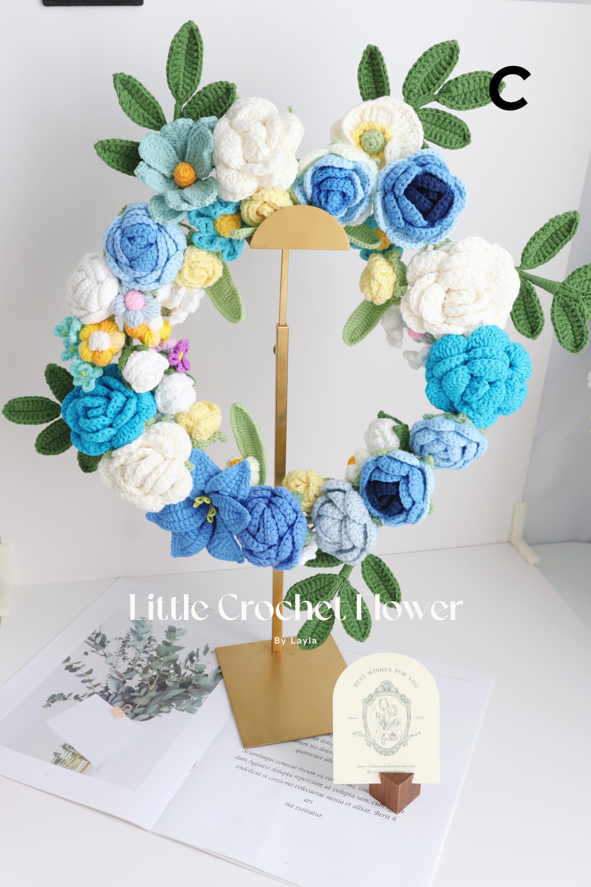 かぎ針編みの春の花のリースの手作りの花のリース、母親への