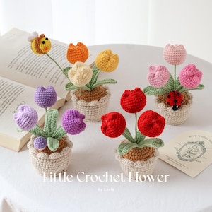 Può includere: Una tazza di ceramica bianca con manico nero e la scritta "But First, Coffee" in nero, in grassetto. La tazza è su una superficie bianca. La tazza è alta 10 cm.