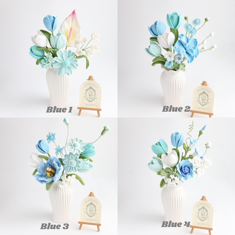 May include: Four arrangements of crocheted flowers in white fluted vases, labeled Blue 1 through Blue 4. Each bouquet features various shades of blue and white yarn flowers, green leaves, and stems, displayed with a small wooden easel and card.