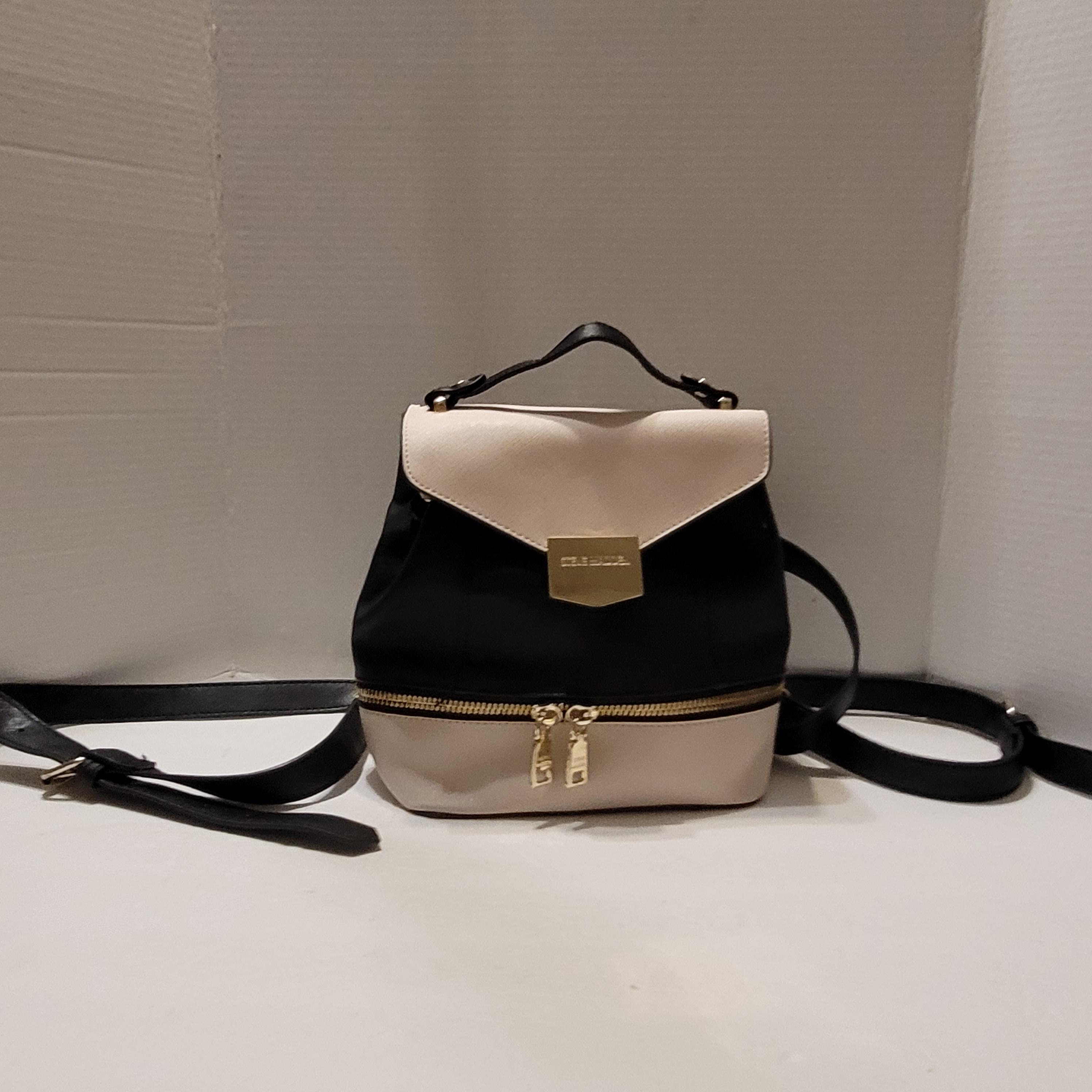 Steve Madden Black synthetic embossed small backpack gold tone hardwares. NWT Steve Madden black Embossed Logo mini | Mercari main image 2