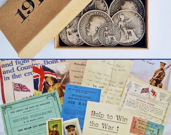 May include: A brown cardboard box marked 1918 filled with silver coins featuring profiles and seated figures, accompanied by a collection of vintage paper ephemera including war-era notices, handwritten letters, patriotic pledges, and small portrait cards.